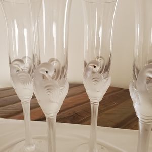 Set of 5 crystal swan champagne flutes.